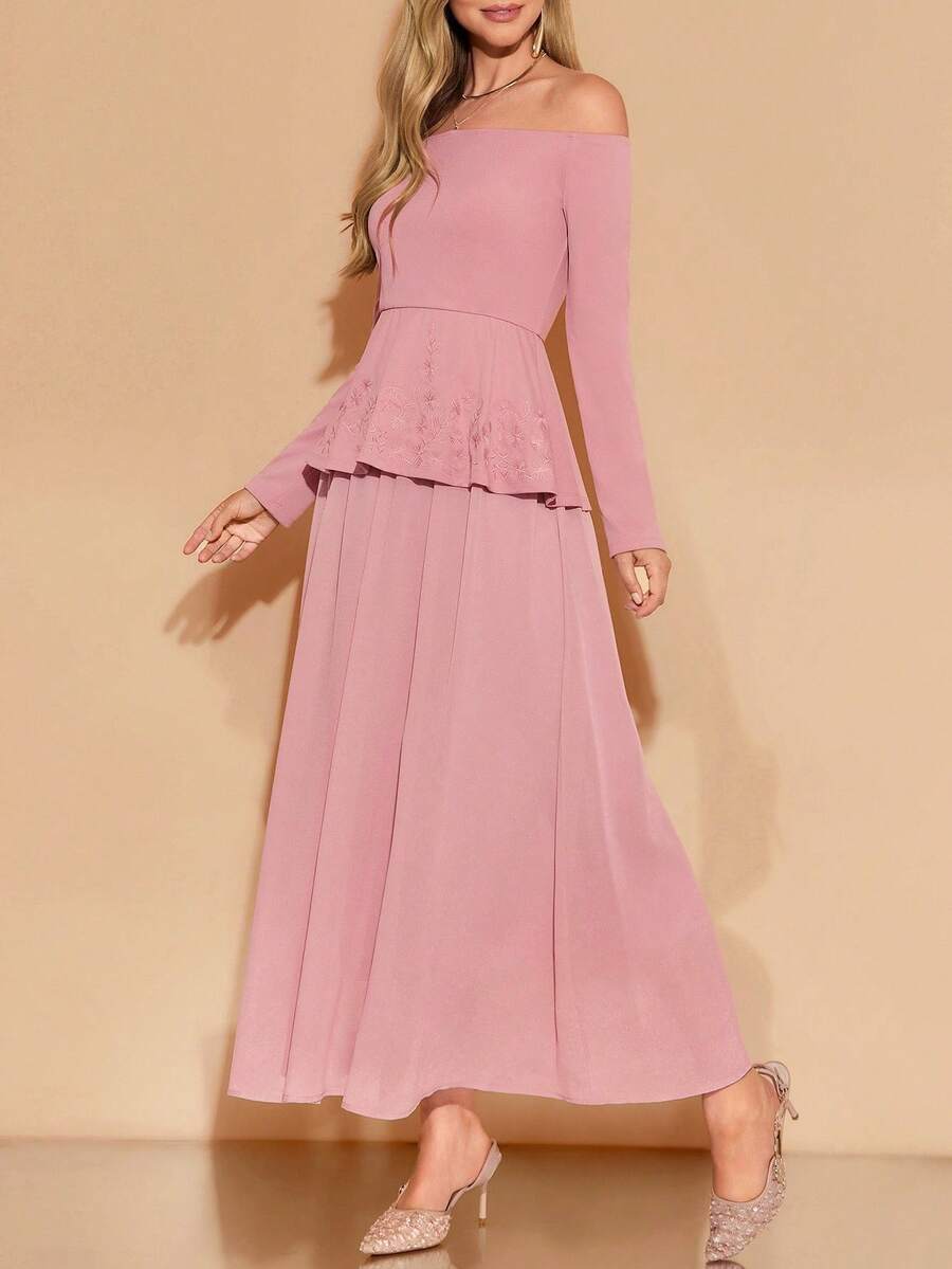 Pink off-shoulder dress worn by a model on a beige background