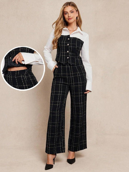 Woman wearing a black checkered jumpsuit over a white shirt on a beige background