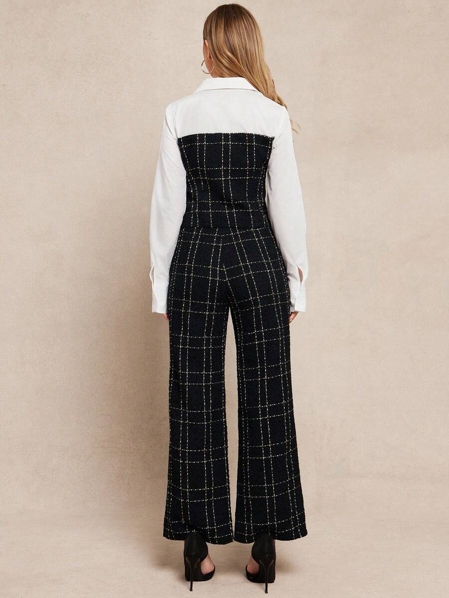 Person wearing a black checkered jumpsuit with a white shirt underneath on a beige background