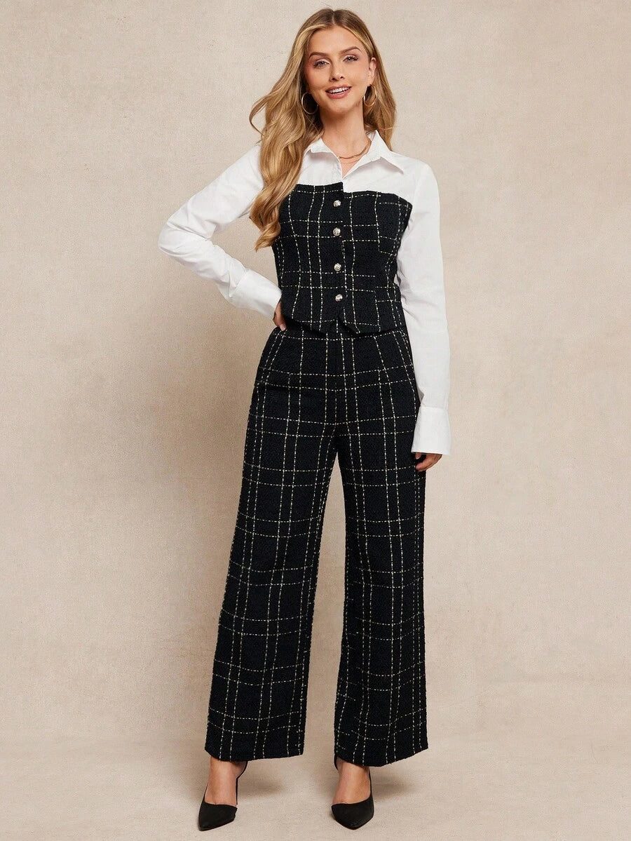 Woman wearing a black checkered jumpsuit over a white shirt on a beige background
